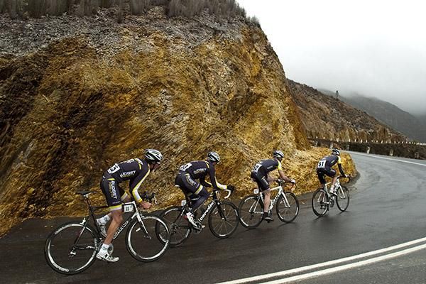 The team from Budget Forklifts heads for the clouds on the 4.8km team time trial in Queenstown.