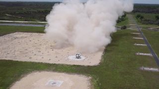 NASA's Morpheus lander prototype is seen just after landing on a mock lunar surface during in this still from a NASA video recording at the Kennedy Space Center in Florida during an April 30, 2014 test flight.