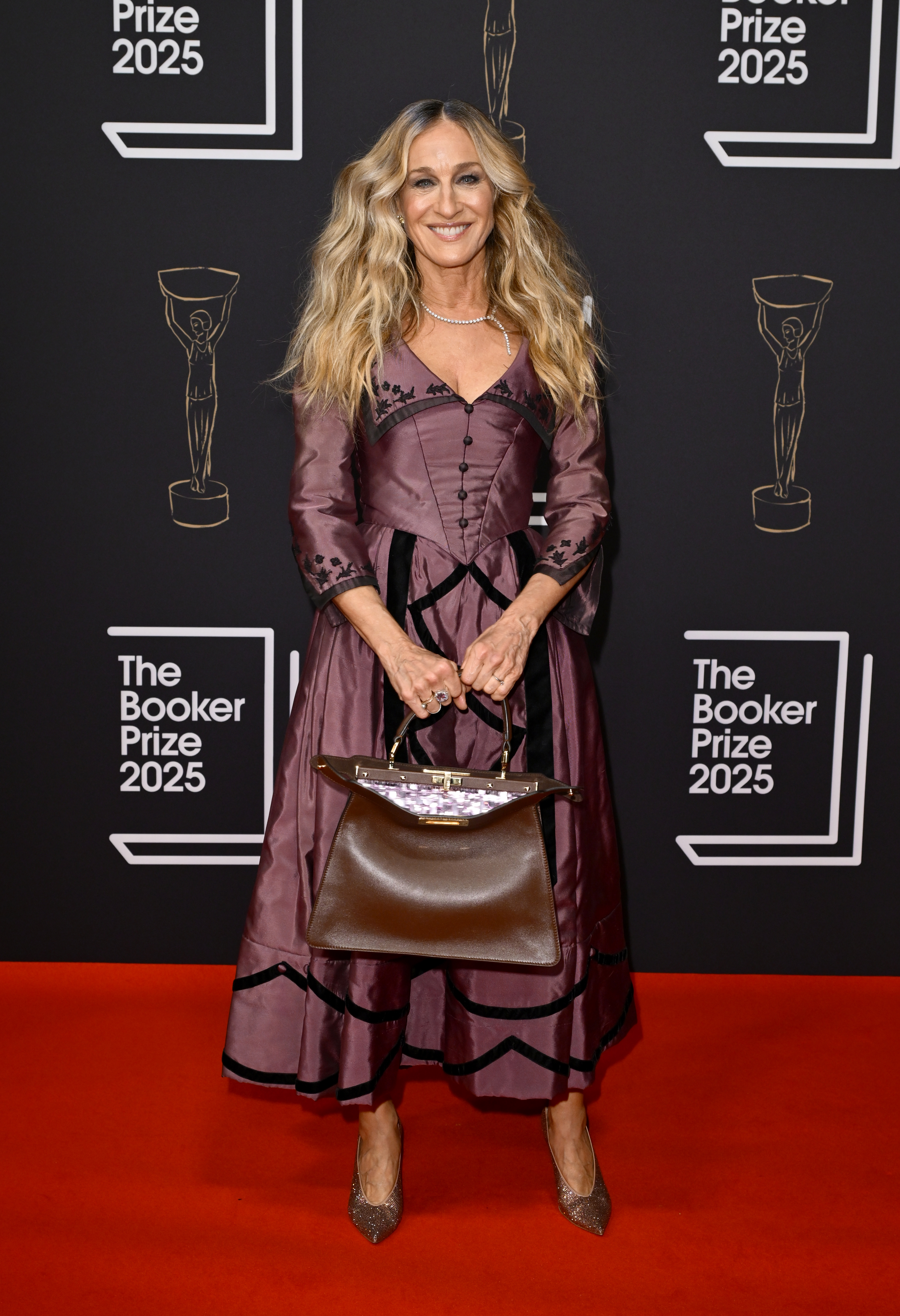 Sarah Jessica Parker attended the Booker Prize 2025 event in a corseted dress and a brand-new Fendi peekaboo bag