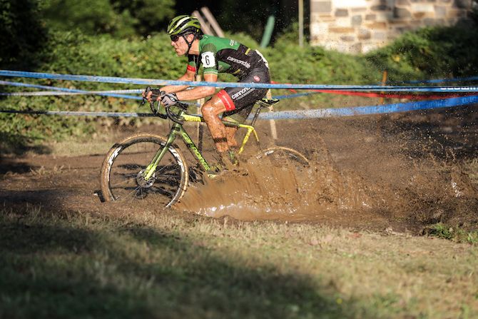 Curtis White (Cannondale p/b CyclocrossWorld) makes a splash on his way to third place on day two of the 2018 Charm City Cross