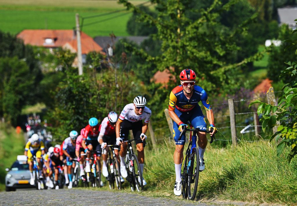 GERAARDSBERGEN BELGIUM SEPTEMBER 01 Edward Theuns of Belgium and Team Lidl Trek competes passing through the Paterberg cobblestones sector during the 20th Renewi Tour 2024 Stage 5 a 2027km stage from Menen to Geraardsbergen UCIWT on September 01 2024 in Geraardsbergen Belgium Photo by Luc ClaessenGetty Images