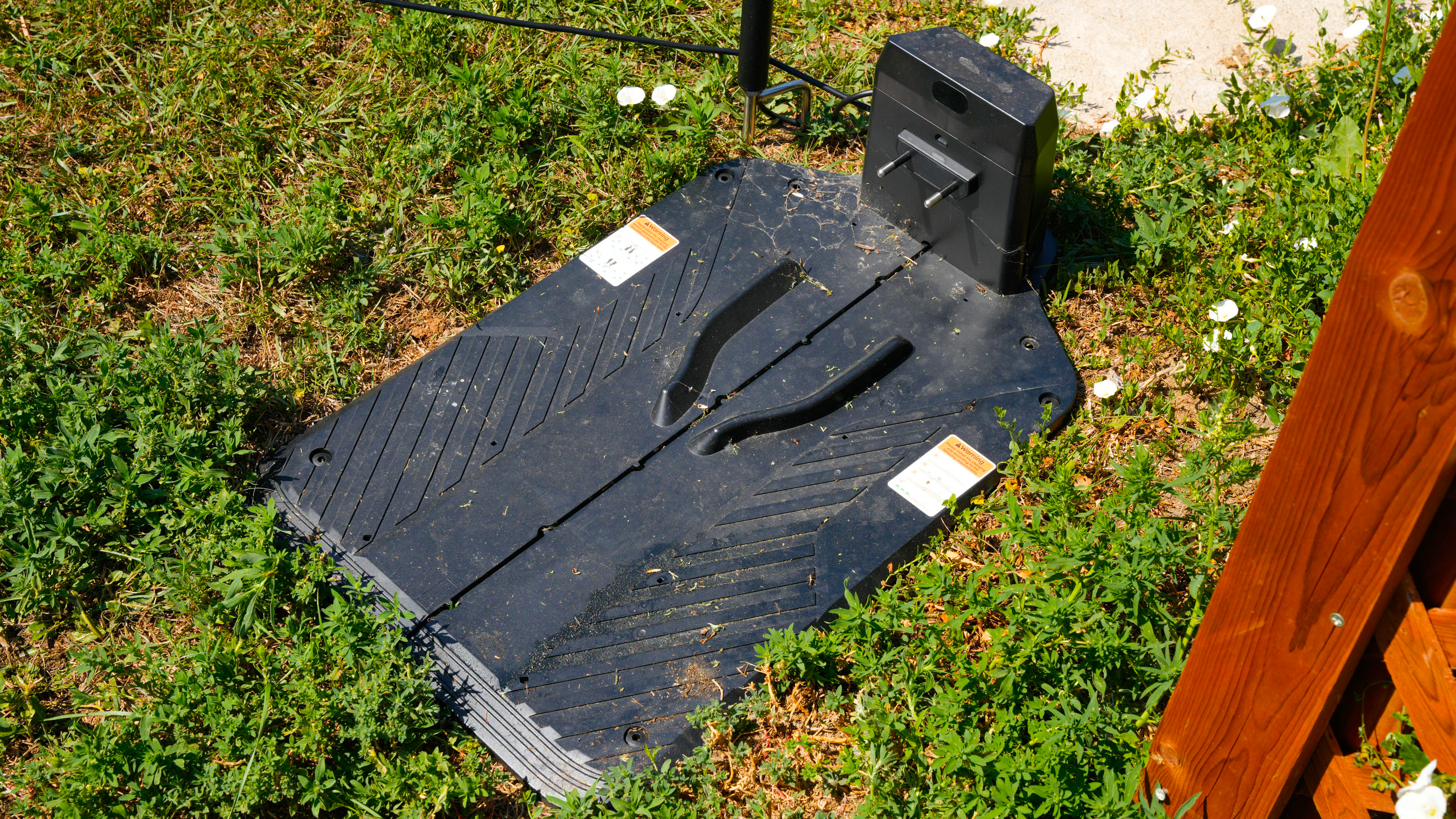Anthbot Genie 3000 being tested in a bright green yard