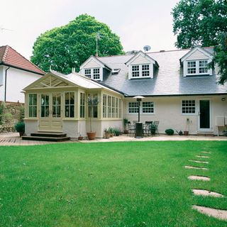ideal home bungalow with roof extension and garden room