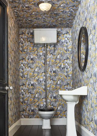 bathroom with animal wallpaper