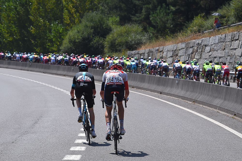 A pair of riders find themselves on the opposite side of the barriers.