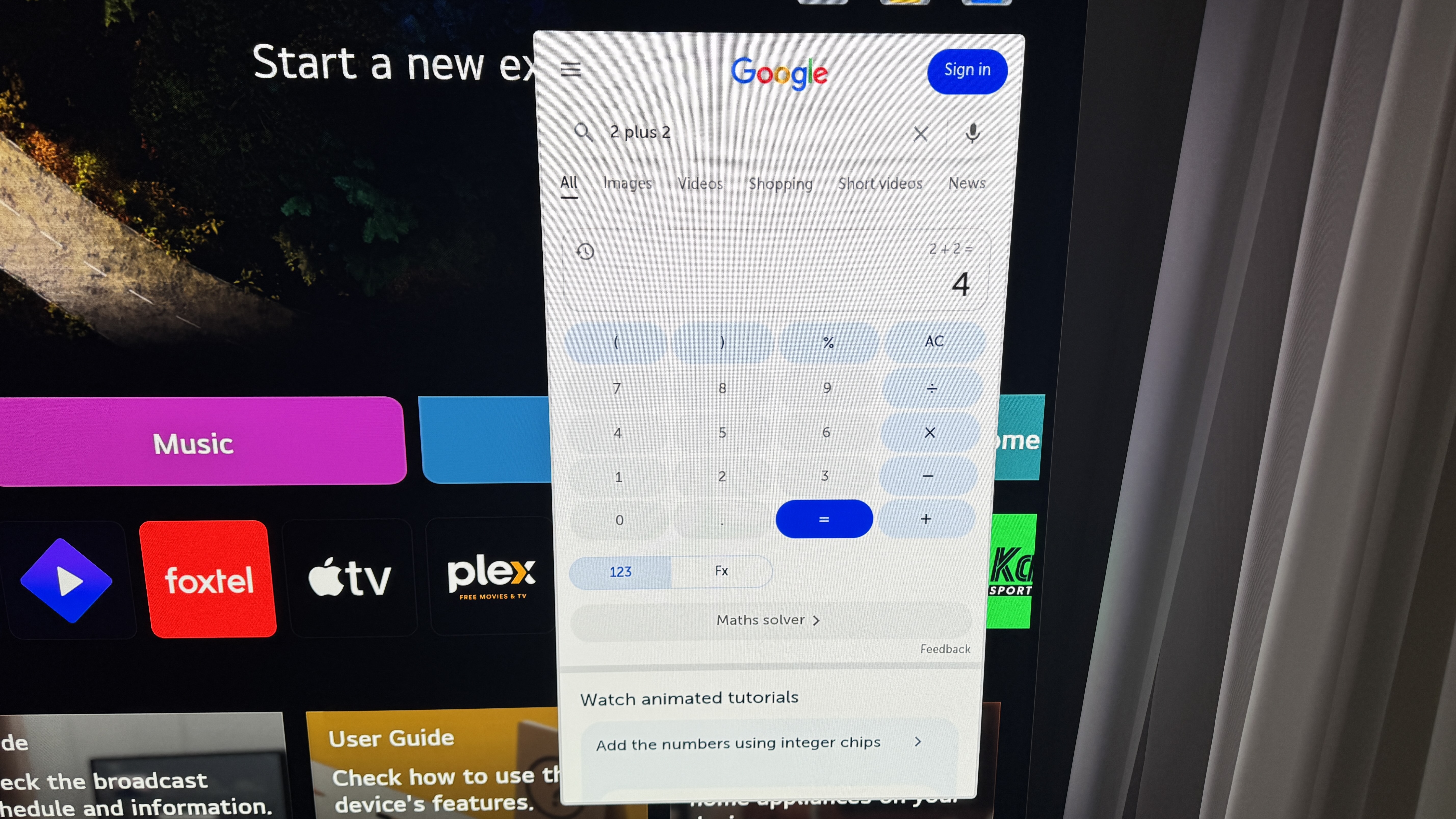 Web browser showing Google calculator on LG G5 OLED TV