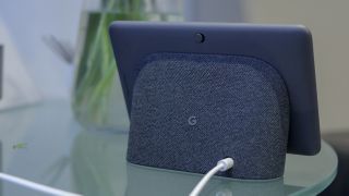 A photo of the Google Home hub in situ on a table