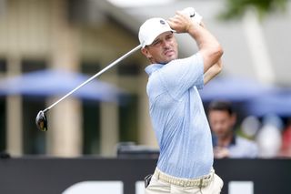 Bryson DeChambeau hits a tee shot