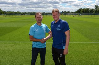 Newcastle United Head Coach Eddie Howe (L) shakes hands with Newcastle United's Sporting Director Dan Ashworth (R) after signing a new contract at Newcastle United Training Centre on August 05, 2022 in Newcastle upon Tyne, England.