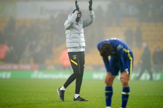 Chelsea manager Thomas Tuchel applauds the fans after the match