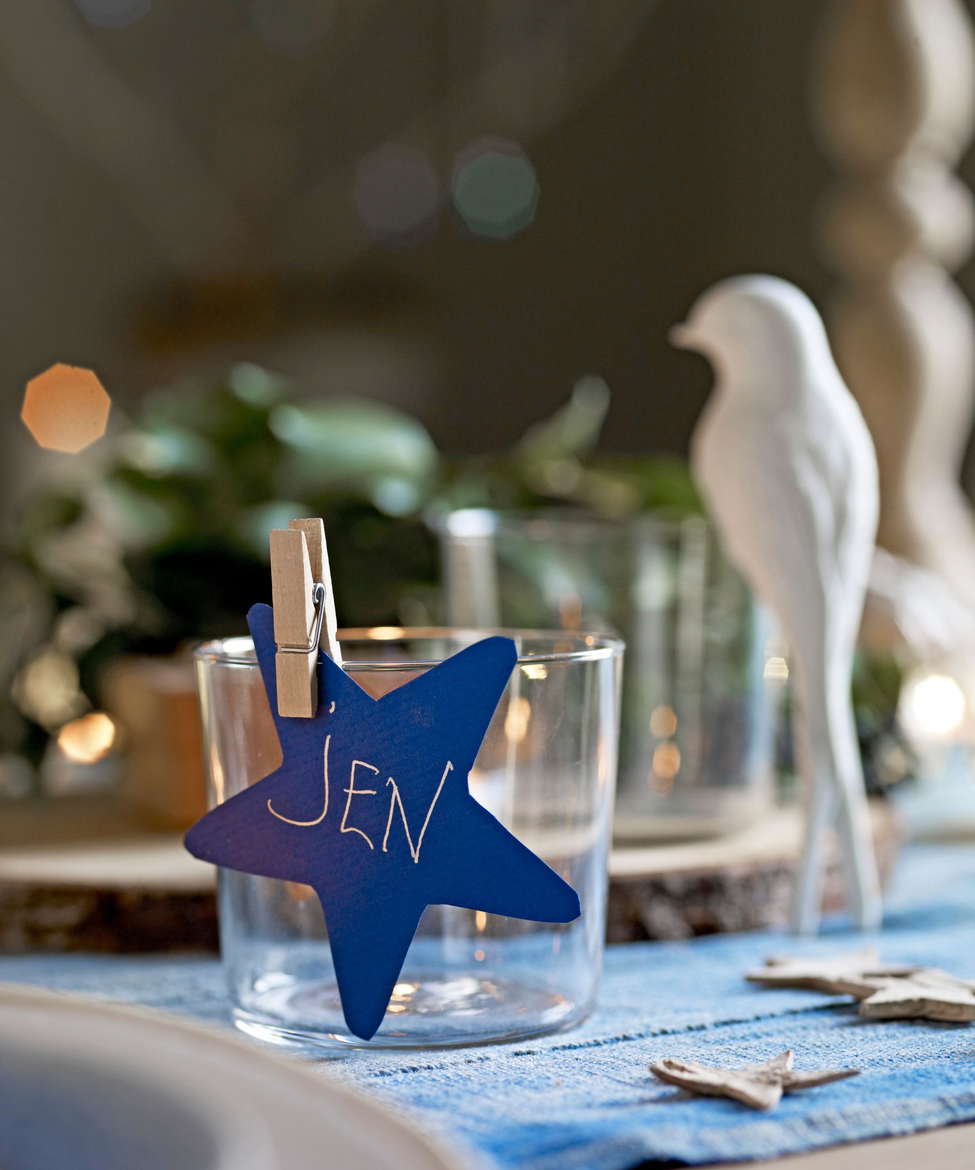 Star place card with a name on, on a festive table