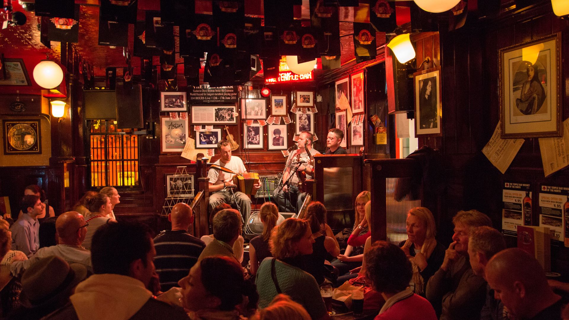 Traditional Irish folk music performed live inside The Temple Bar in Temple Bar district, Dublin, County Dublin, Ireland.