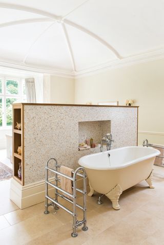 bath in bedroom hidden behind panel in 19th century rectory