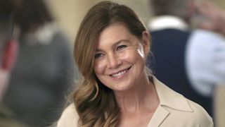 Meredith smiles big on Grey's Anatomy.