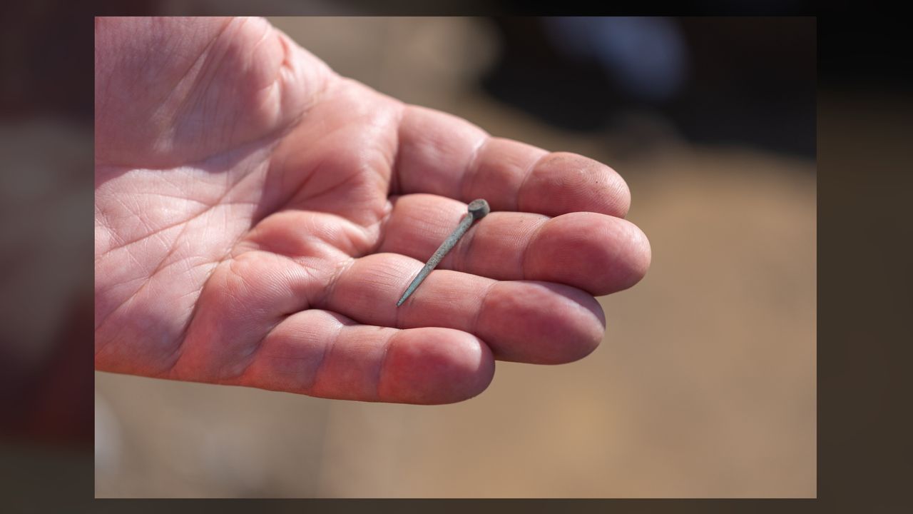 The excavators have found pieces of jewelry and personal items, such as this copper pin which may have been used to fasten clothing.