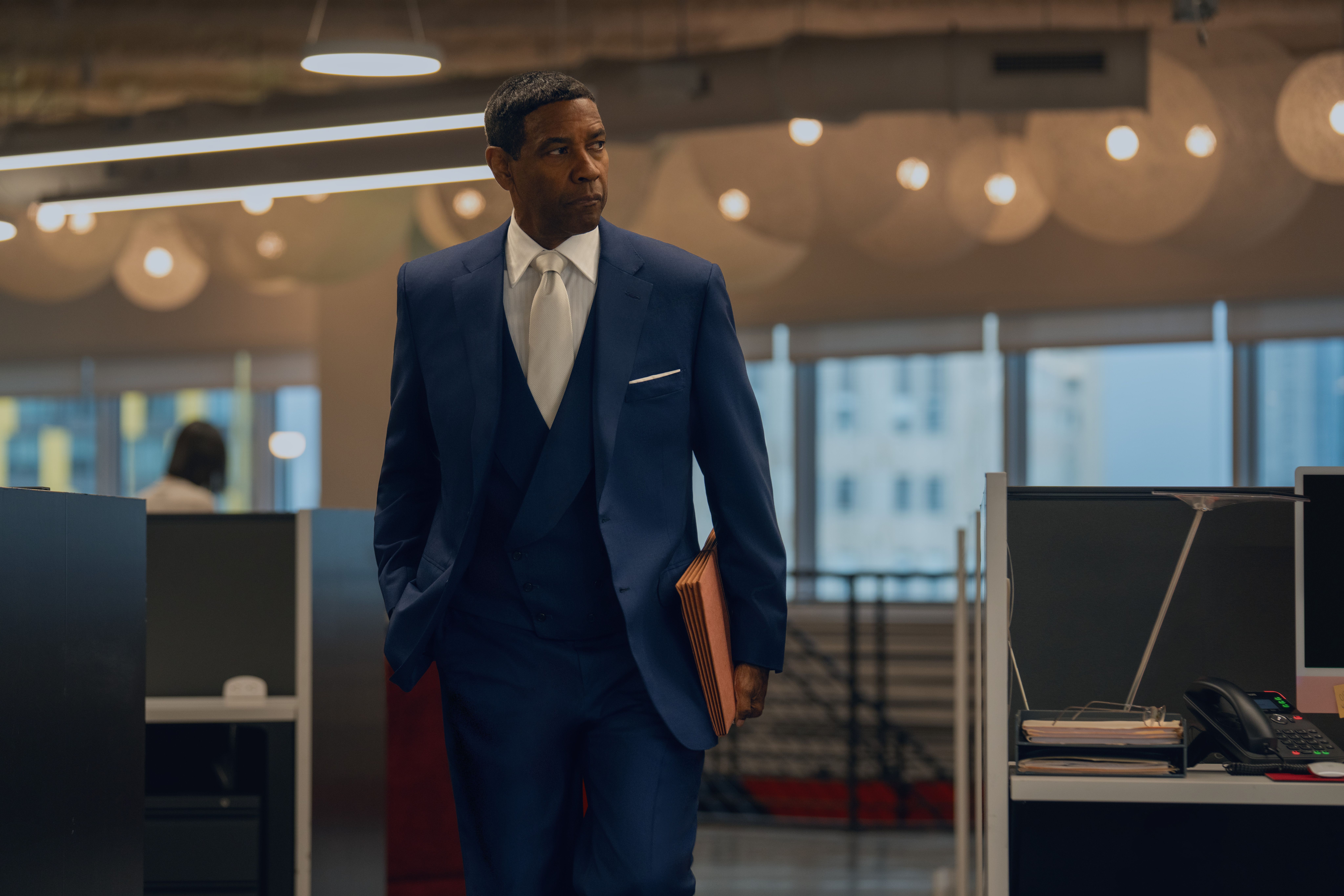Denzel Washington as David King, walking through an office, in 'Highest 2 Lowest.'
