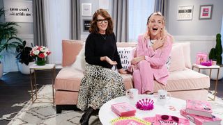 Tina Fey and Busy Philipps laughing during a Facebook Live event