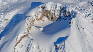 an aerial image of the crater of Mount Spurr