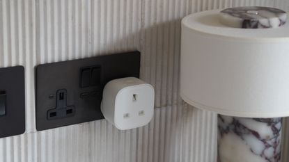 ikea tretakt smart plug in a modern interior setting