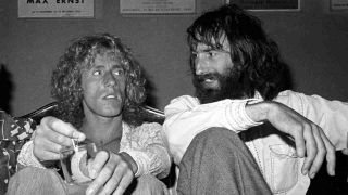 Arthur Brown and Roger Daltrey in a restaurant in 1975