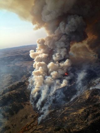 A photograph of the Eagle Creek wildfire in Montana, taken in late September, 2012. As of Oct. 24, wildfires nation-wide have burned through an area larger than Maryland, which is the second-largest area burned, year-to-date, since the 1960s. 
