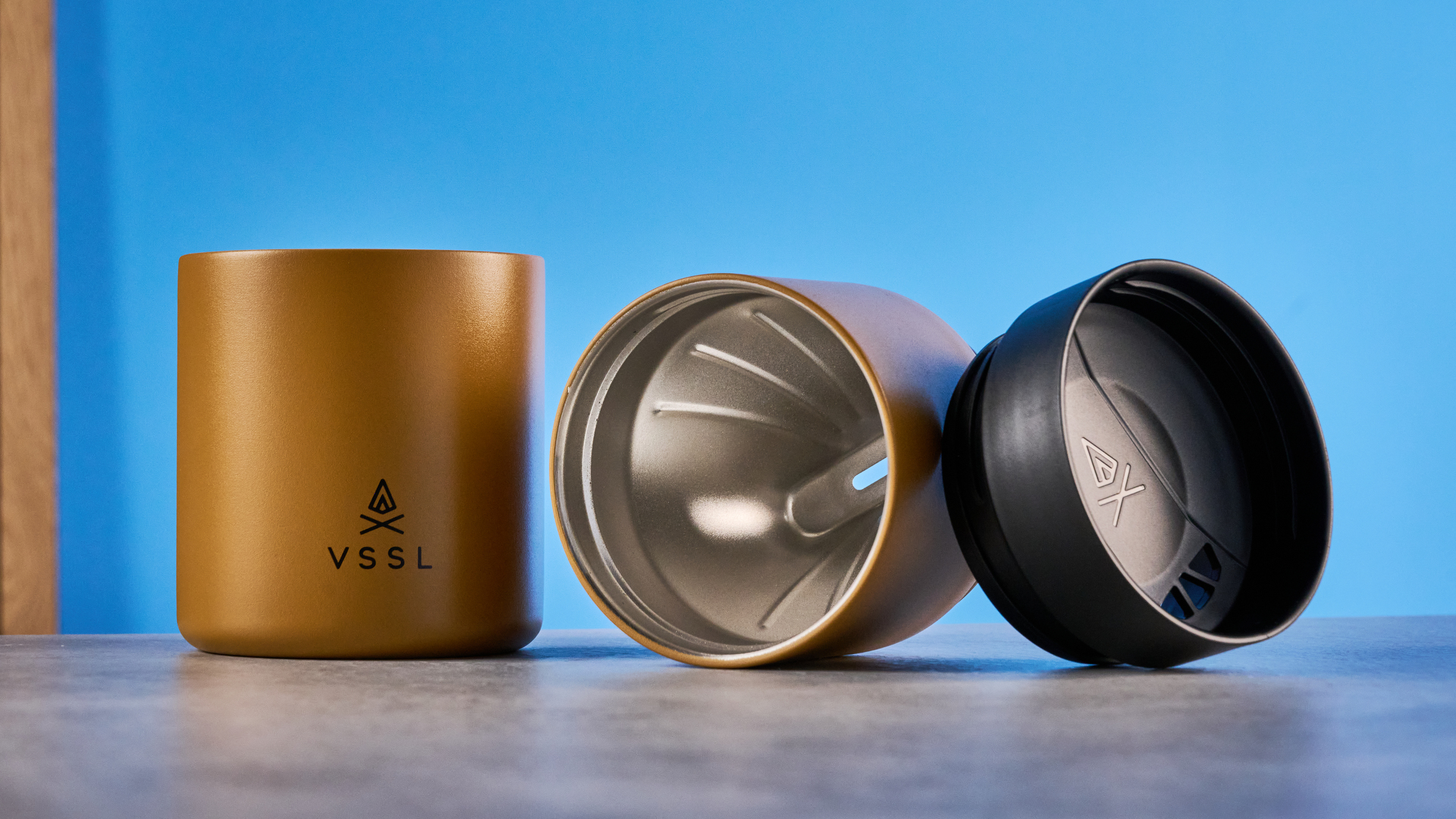 the VSSL Nest Pour Over Coffee Set in gold photographed against the blue tom's guide background