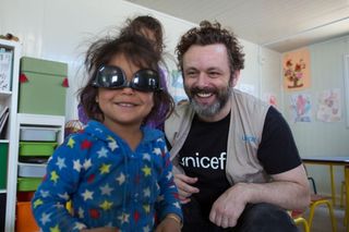 Unicef UK ambassador Michael Sheen meeting children in 1st- 3rd Grade Classes at a Unicef supported- primary school in Za'atari refugee camp in Jordan