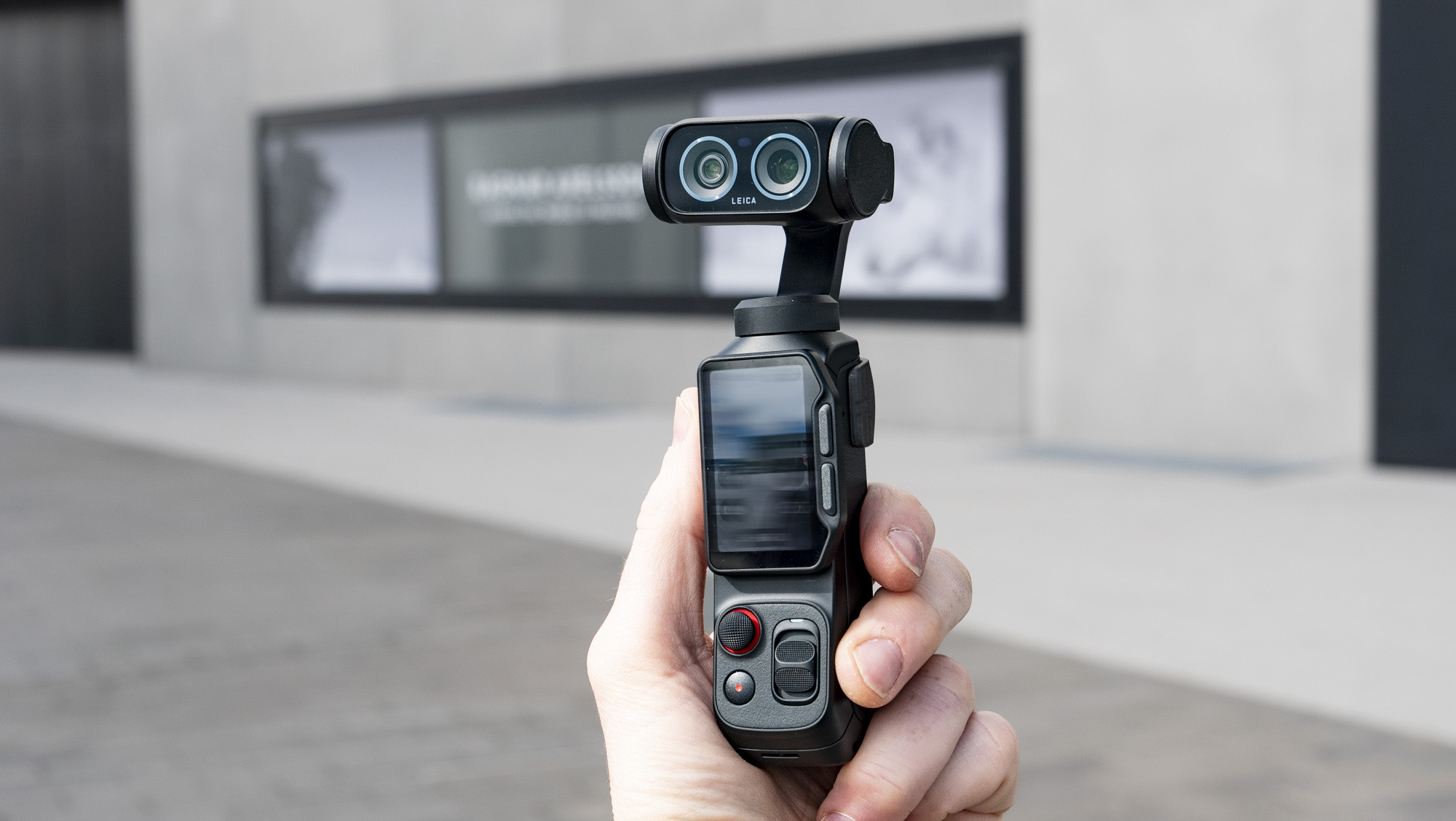 Insta360 Luna Ultra vlogging camera in the hand