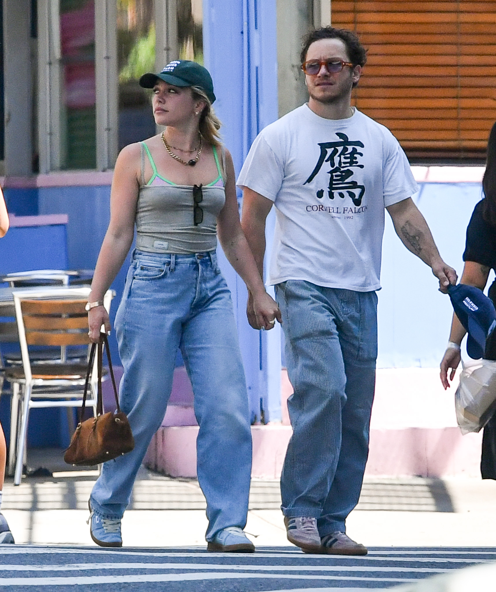 Florence Pugh styled the summer 2026 suede sneaker trend with jeans and a tank top