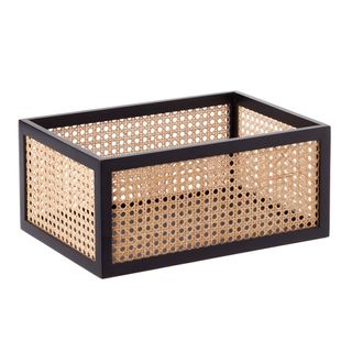 A black and rattan storage bin