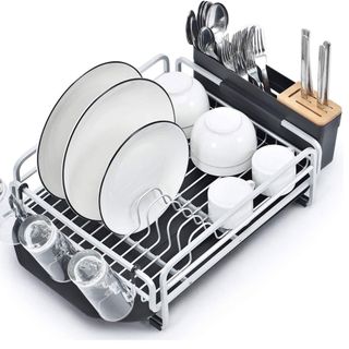 utensil rack with dish plate bowl spoon and glasses