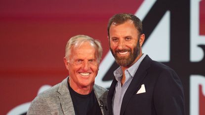 Greg Norman poses with Dustin Johnson