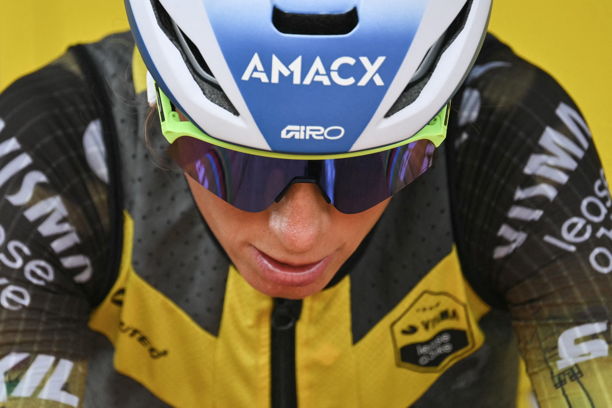 Team Visma | Lease a Bike's French rider Pauline Ferrand-Prevot looks down as she warms up ahead of the 3rd (out of 9) stage of the fifth edition of the Women's Tour de France cycling race, 156.5 km from Geneva to Poligny, in Poligny, central-eastern France on August 3, 2026. (Photo by NICOLAS TUCAT / AFP)