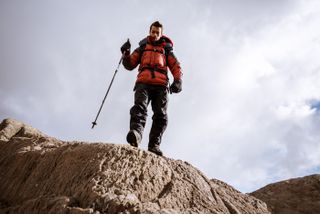 best trekking poles: hiker with a pole