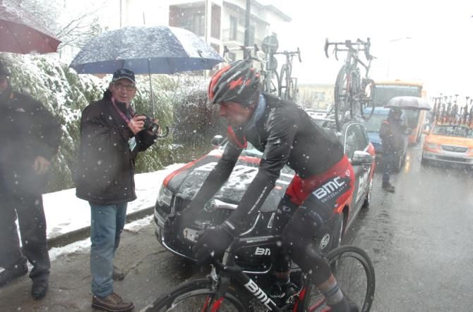 A BMC rider struggles in the cold conditions