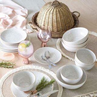 tableware with tablecloth and cutlery and glass