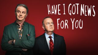 A posed shot of Paul Merton with his arms folded looking away to his right with a bemused expression. Beside him Ian Hislop looks with suspicion to his left. This is imposed on a dark red background with the words: "HAVE I GOT NEWS FOR YOU" in white in the upper right hand corner of the image.