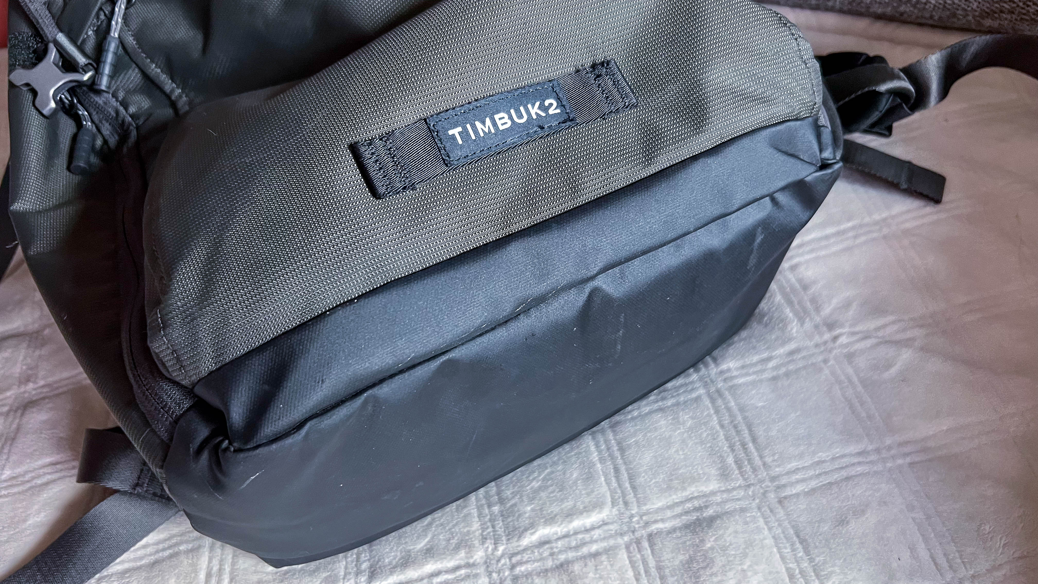 Timbuk2 Division Laptop Backpack Deluxe on the reviewer's couch