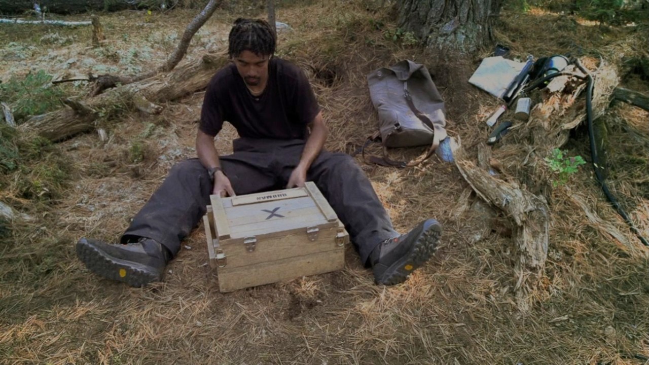 Rhoman putting fire in a box on Extracted