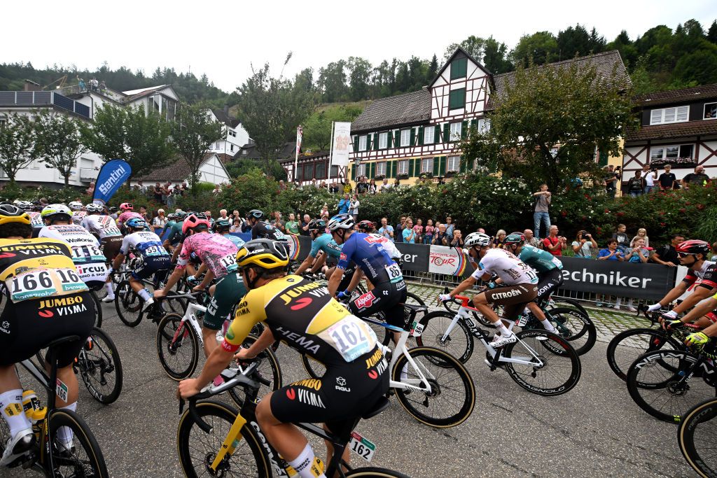 STUTTGART GERMANY AUGUST 28 Lars Boven of Netherlands and Jumbo Visma Team Henri Uhlig of Germany and Team AlpecinDeceuninck Greg Van Avermaet of Belgium and Ag2R Citroen Team and a general view of the peloton prior to the 37th Deutschland Tour 2022 Stage 4 a 1866km stage from Schiltach to Stuttgart DeineTour on August 28 2022 in Stuttgart Germany Photo by Stuart FranklinGetty Images