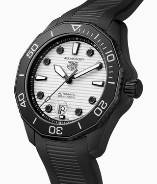 Black tag watch with a white dial against a white background