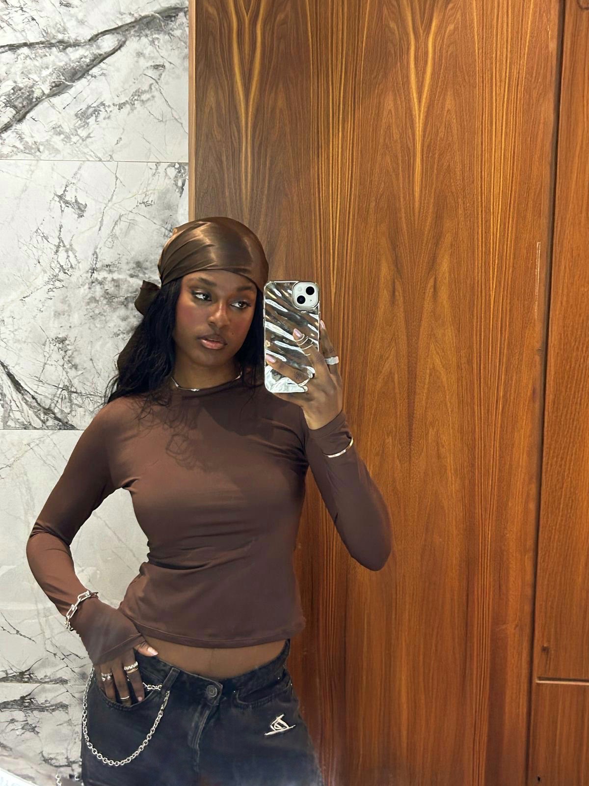 Shei using a silk head scarf