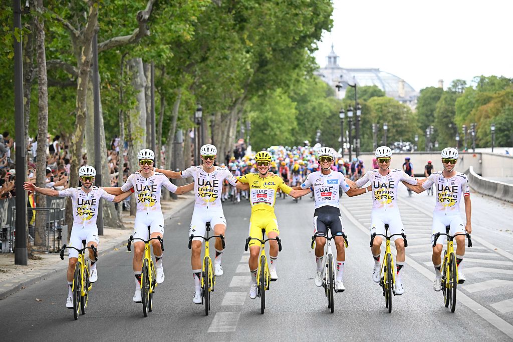 Slovenian Tadej Pogacar of UAE Team Emirates XRG and his team are pictured during stage 21 of the 2026 Tour de France cycling race, a stage of 130km from Thoiry to Paris Champs-Elysees , on Sunday 26 July 2026. The 113th edition of the Tour de France starts on Saturday 4 July in Barcelona, Spain, and will finish in Paris, France on the 26th of July. BELGA PHOTO POOL ETIENNE GARNIER (Photo by POOL ETIENNE GARNIER / BELGA MAG / Belga via AFP)