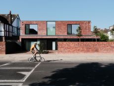 view of geometric brick structure by Coeus London - Serene