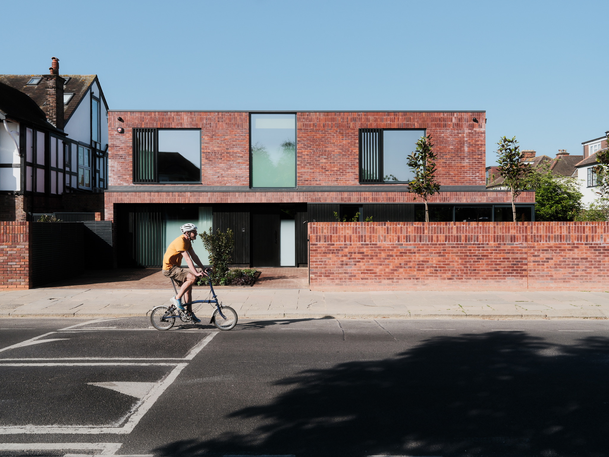 view of geometric brick structure by Coeus London - Serene