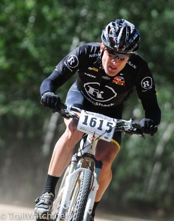 Levi Leipheimer (Team Radio Shack) chasing JHK after crashing with Wells.
