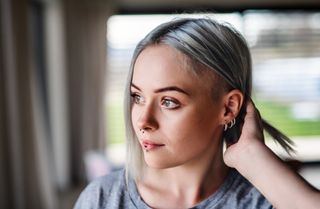 young woman with bob hair and piercings