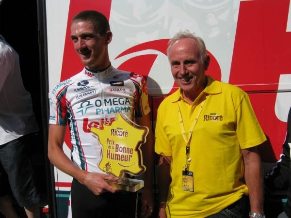 Former Tour de France winner Joop Zoetemelk presents Jurgen Van Den Broeck with the Bonne Humeur prize