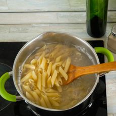 pot of pasta boiling in water on cooktop