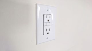 An outlet on the wall of a home